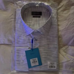 NWT in plastic. Bugatchi Mens XXL 8 way stretch dress shirt. White with blue.